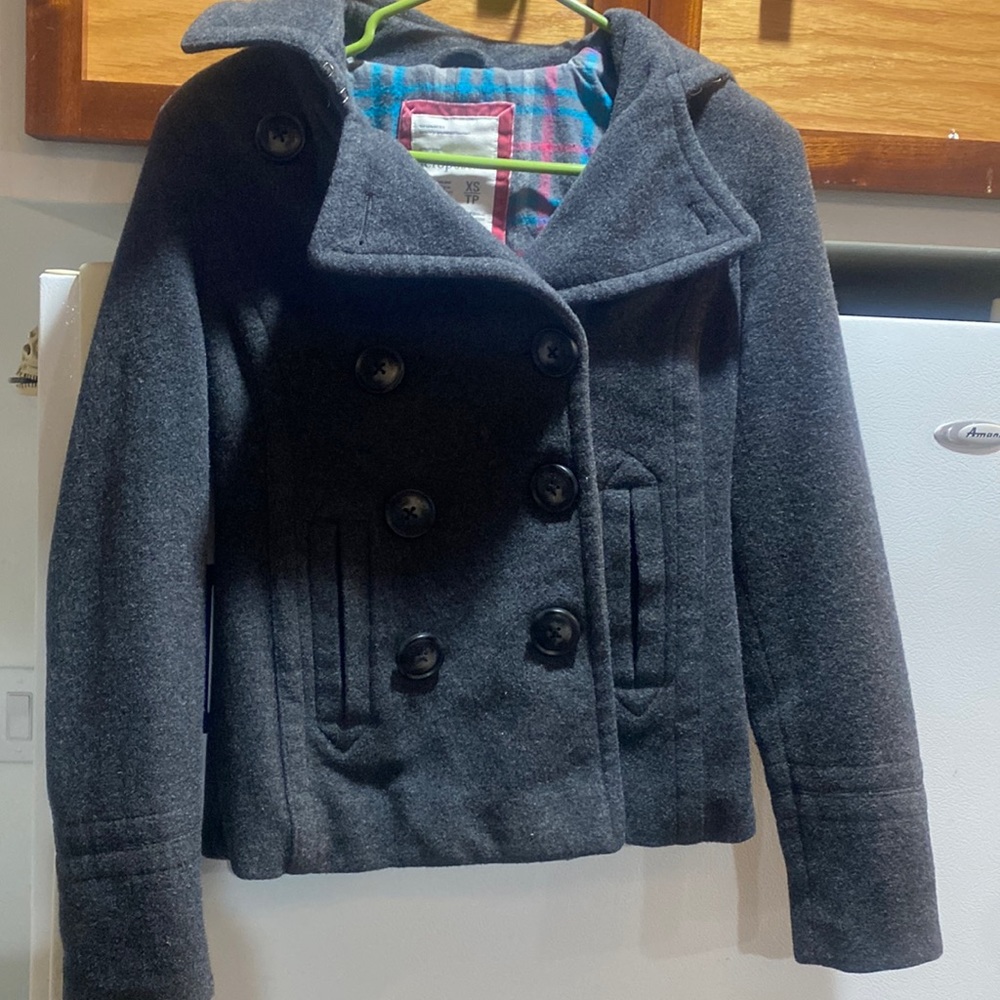 Aeropostale wool pea coat.  It’s in excellent co dictionary.